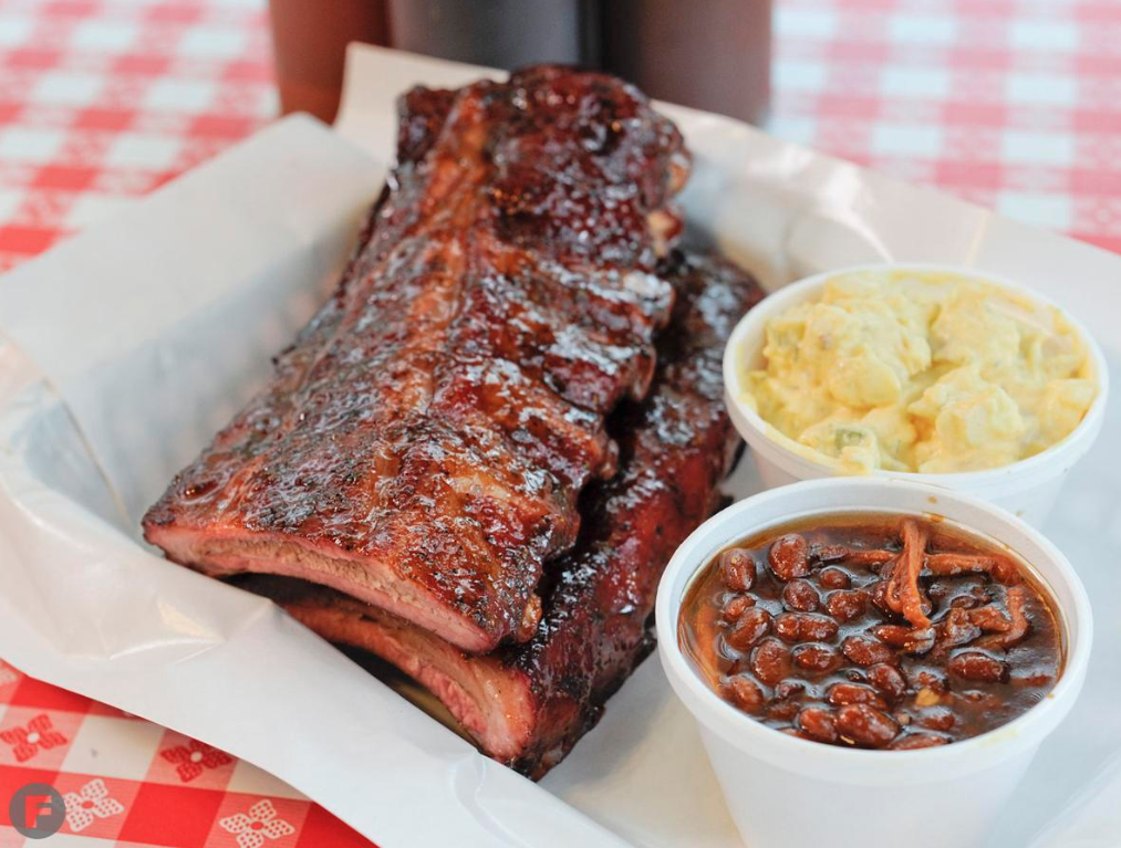 Bogart’s Smokehouse signature dishes Full Slab with 2 Sides, Beef Brisket Sandwich, Beef Brisket Platter.